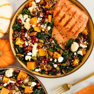 Autumn Salmon & Squash bowl with kale, butternut squash, apples, cauliflower, pomegranate seeds, pecans, pumpkin seeds, quinoa and feta cheese