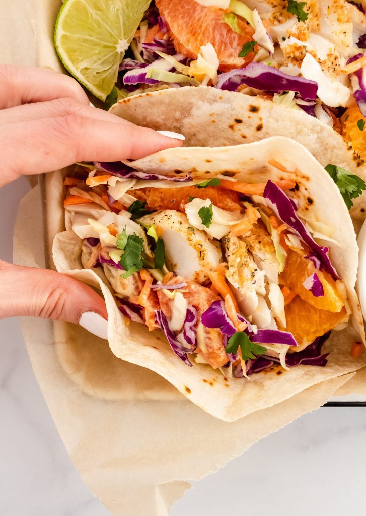 baked cod fish tacos with citrus tahini coleslaw