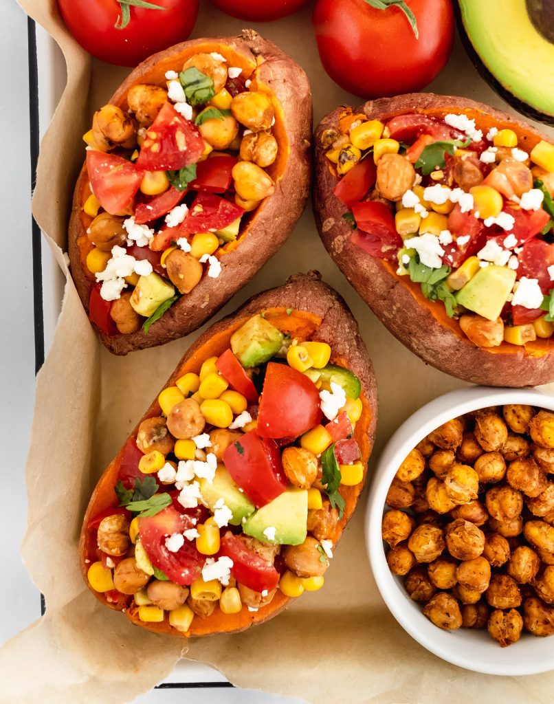 bbq sweet potatoes with chickpeas, corn, avocado and campari tomatoes