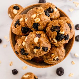 blueberry-energy-bites-with-lemon-coconut-oats-almond-butter-and-white-chocolate-chips