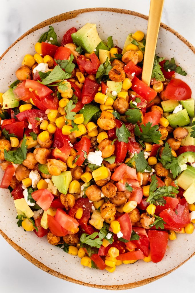 chickpea, corn, avocado and campari tomato salad