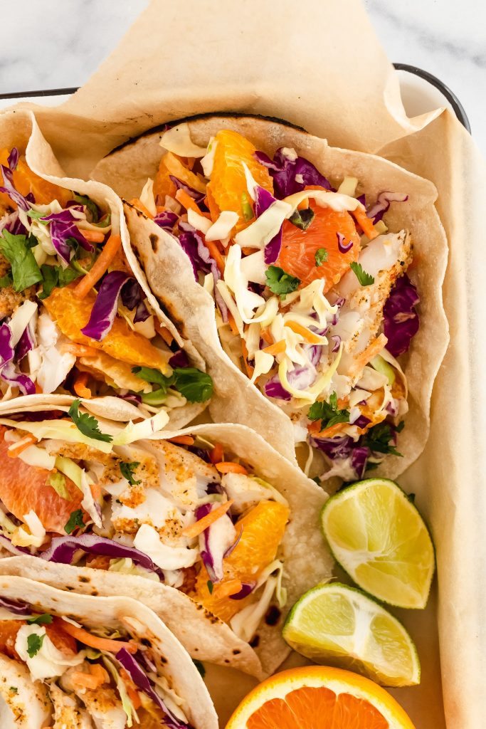citrus cod fish tacos with tahini coleslaw