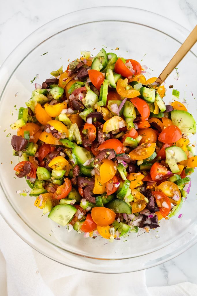Diced Greek Salad with Tomatoes, Cucumbers, Olives, Red Onion, Green Pepper and Dill for Whipped Feta Toast