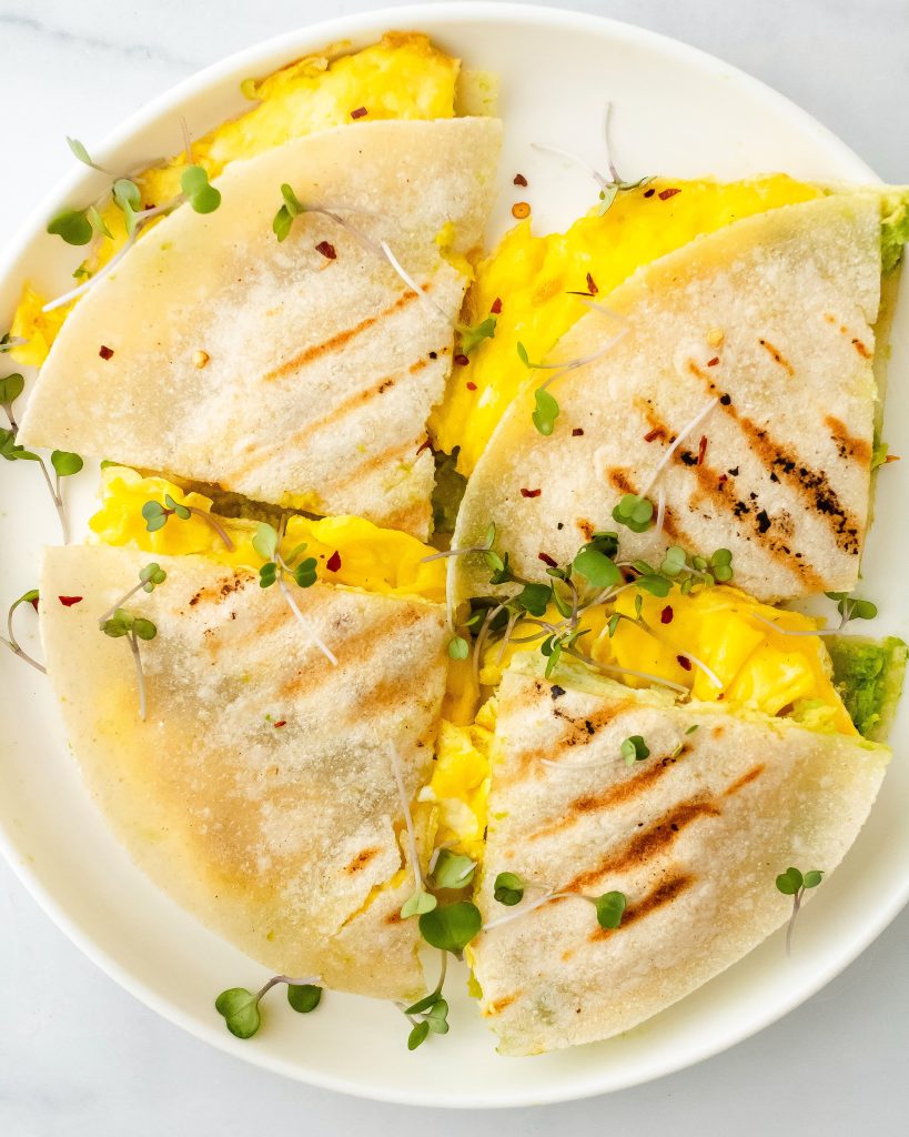 egg avocado breakfast quesadillas with greens on top 