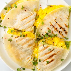 egg avocado quesadillas with greens on top