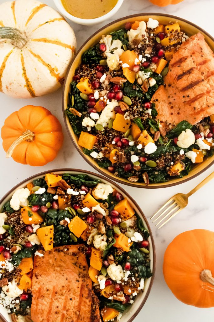 gluten free fall salad with fall salmon, butternut squash, kale, pomegranate seeds and quinoa - salmon harvest bowl