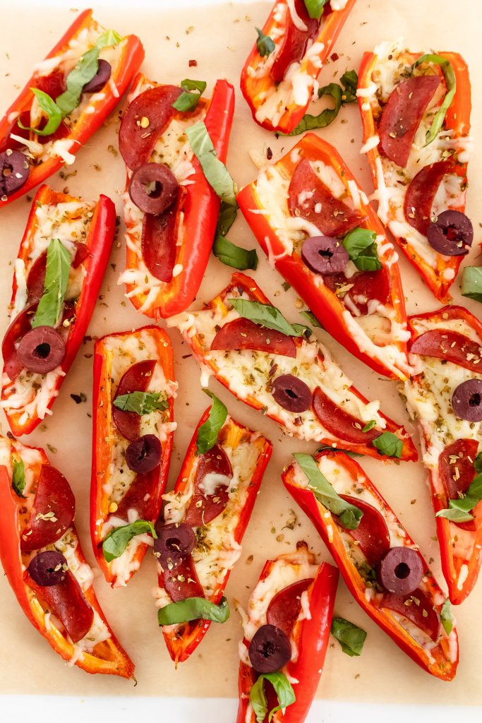 gluten free pepper pizza poppers with cheese, turkey pepperoni, olives and fresh basil