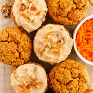 gluten free pumpkin carrot muffins with dairy free cashew cream cheese frosting