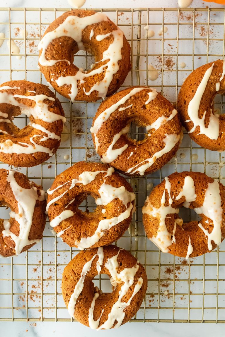 healthy baked pumpkin donuts with pumpkin spice maple glaze