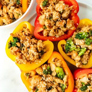 healthy teriyaki turkey stuffed peppers made with carrots and broccoli