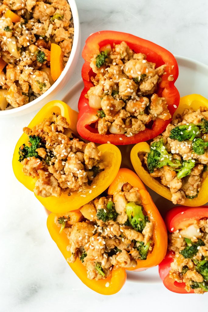 healthy asian stuffed peppers made with turkey carrots and broccoli