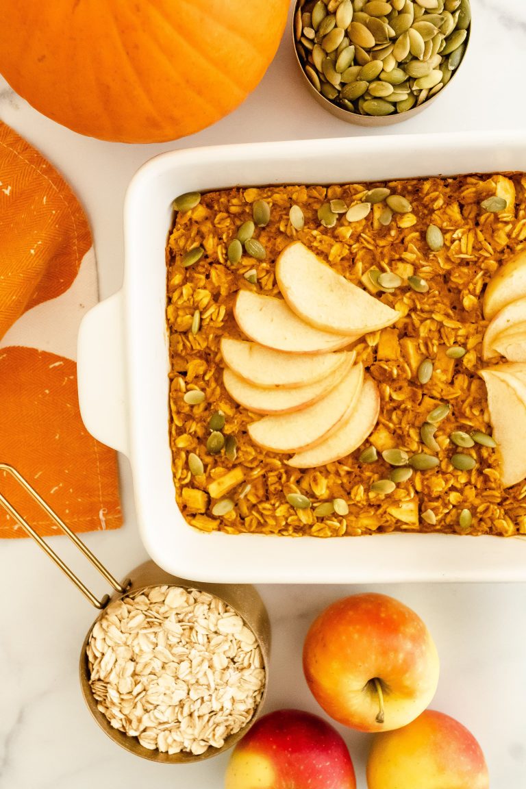 pumpkin apple baked oatmeal with oats, pumpkin puree, apples, pumpkin seeds and cinnamon
