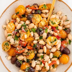 tomato and herb white bean salad with olives and roasted red pepper