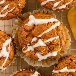 whole wheat pumpkin muffins with white chocolate drizzle